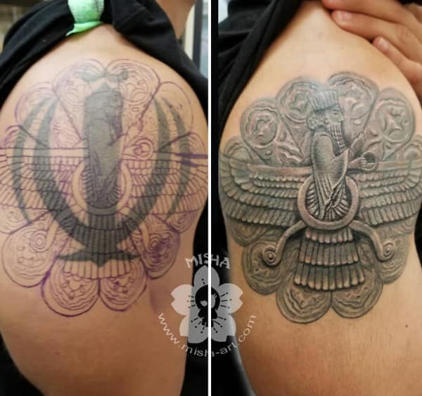 Detailed Faravahar shoulder tattoo cover up with intricate Persian wings and ancient symbol design.