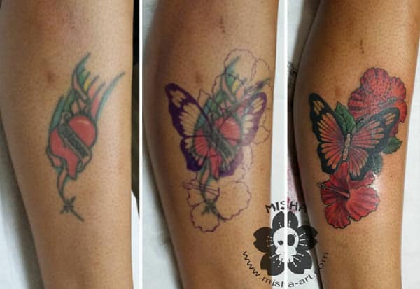 Colorful butterfly and hibiscus flower calf tattoo cover up with tropical design.