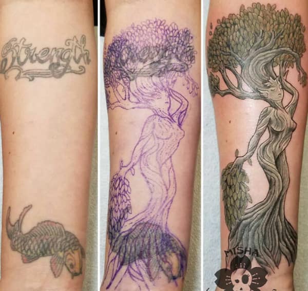 Tree woman tattoo cover up replacing koi fish and lettering forearm design.