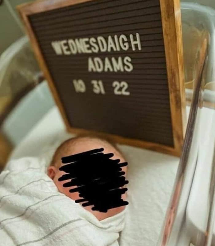 A baby name fail showing a newborn's name announced as the "tragedeigh" spelling "Wednesdaigh" on a letterboard.