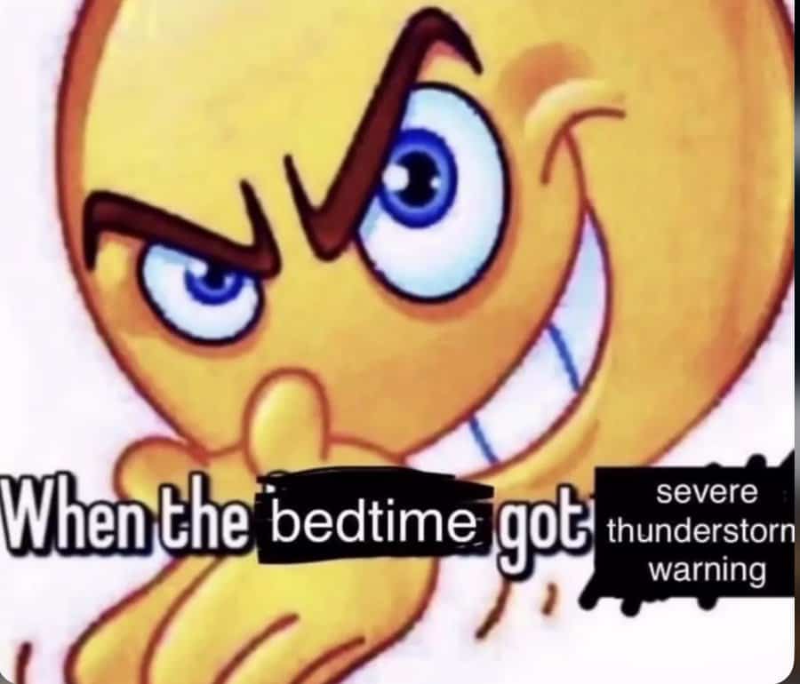 A devious-looking emoji meme about the excitement of having a severe thunderstorm warning right at bedtime.
