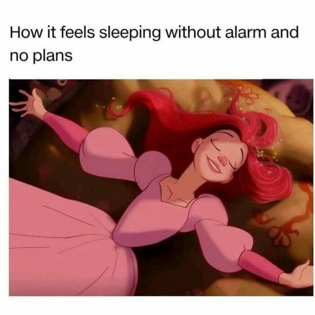 Animated red-haired princess peacefully asleep, with the caption “How it feels sleeping without alarm and no plans.”