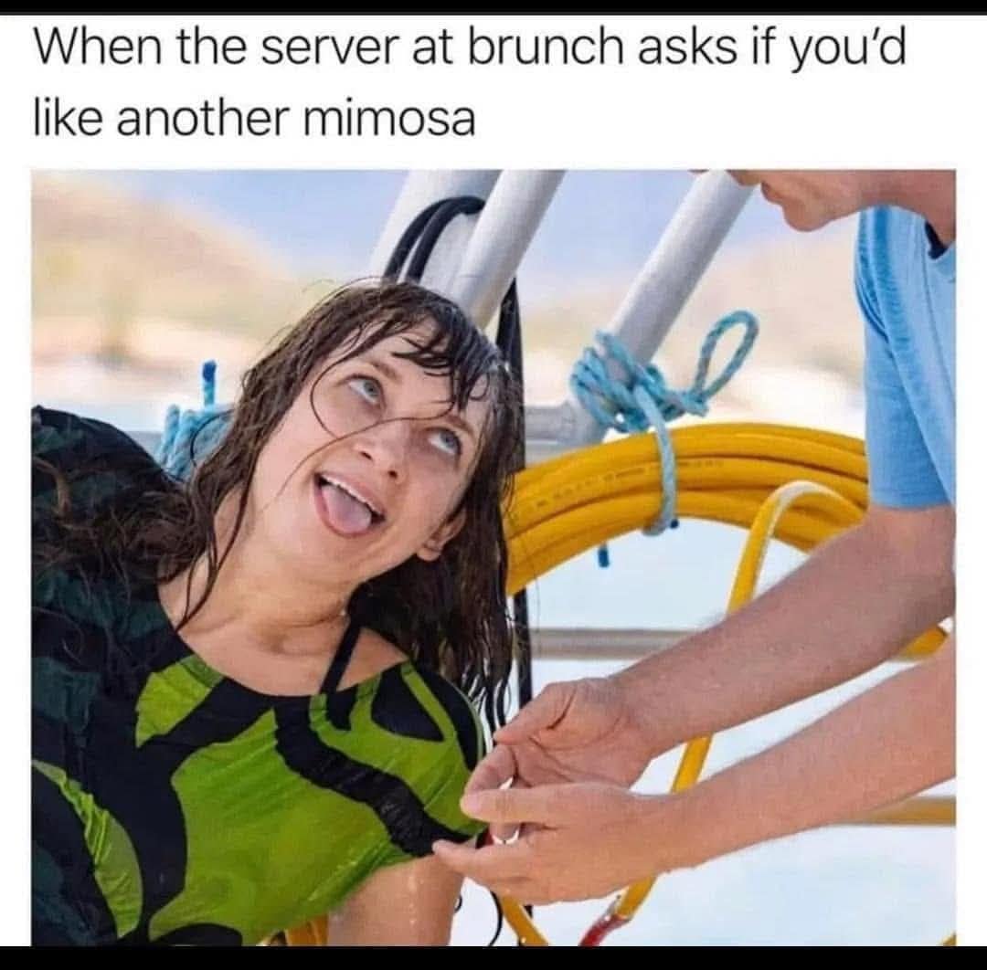 soaked woman makes goofy face as server asks if she wants another mimosa at brunch