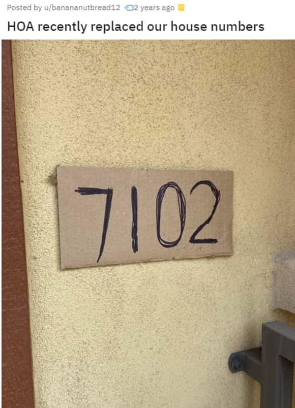 A condo HOA nightmare where the association replaced house numbers with cardboard and marker.