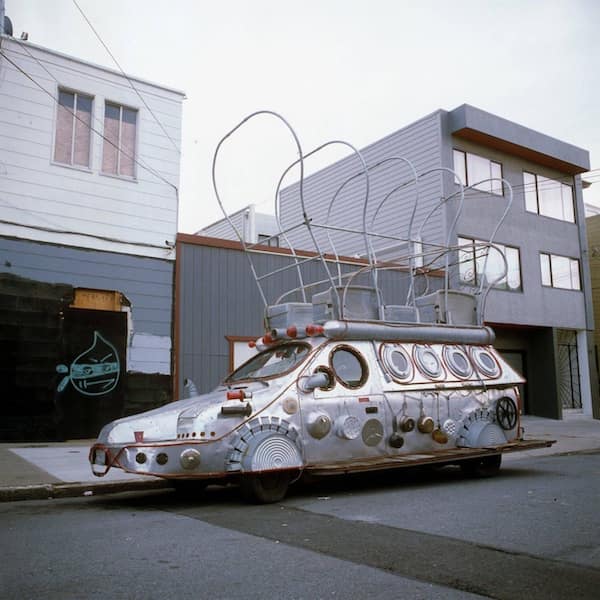 cursed cars covered in metallic kitchen utensil decor