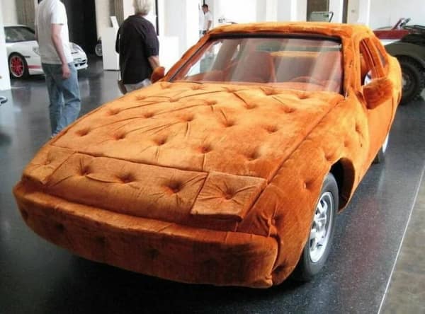 cursed cars covered in orange sofa upholstery fabric