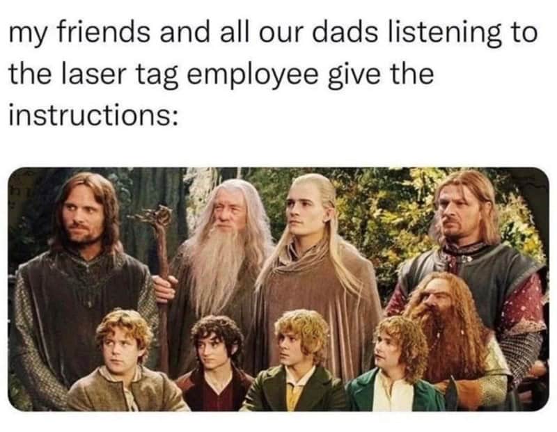 Fantasy adventurer group listening intently—caption about dads and kids paying attention to laser-tag rules.