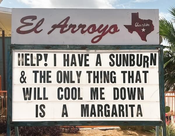 El Arroyo sign about margaritas and sunburn relief