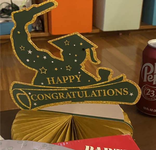 Graduation decoration with odd silhouette