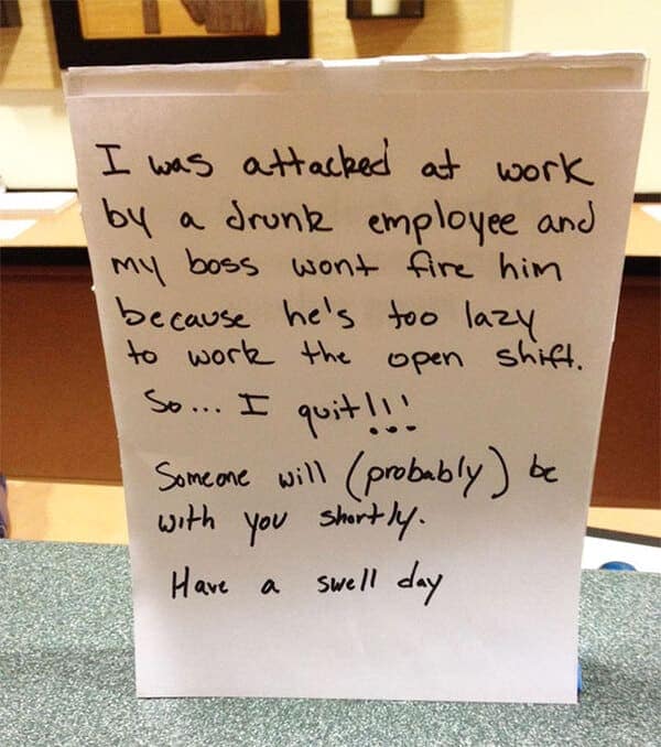 Handwritten note explaining the employee quit after being attacked by a drunk coworker and their boss refusing to fire them.
