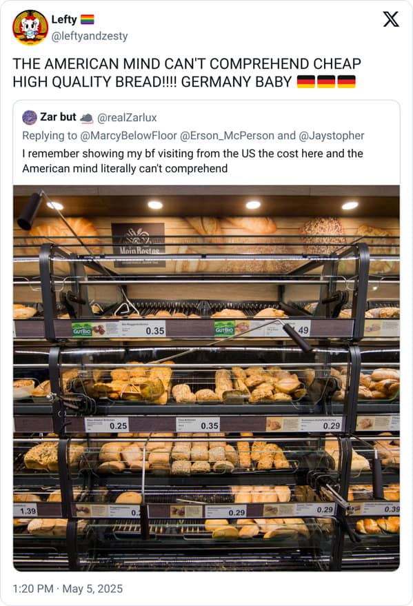 Display of assorted fresh bread rolls with ultra-low price tags.
