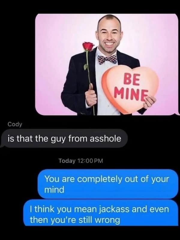 a man holding a heart that says “Be Mine,” with a text mistakenly asking if he's from "Asshole," followed by a correction.