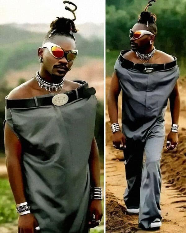 A man wearing a bizarre off-the-shoulder top that looks like a giant pair of pants.