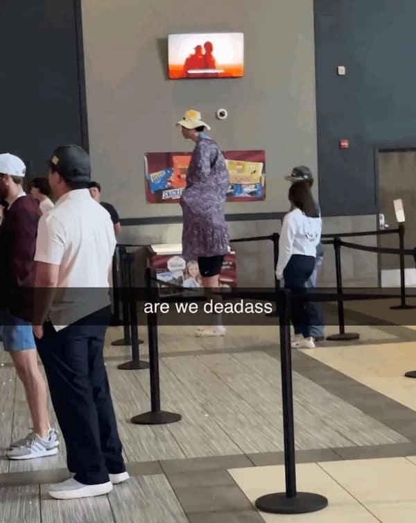 Meme showing tall person wearing trench coat disguise