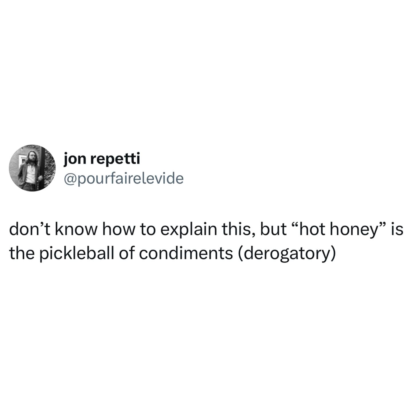 A funny, derogatory tweet comparing the condiment hot honey to the sport of pickleball.