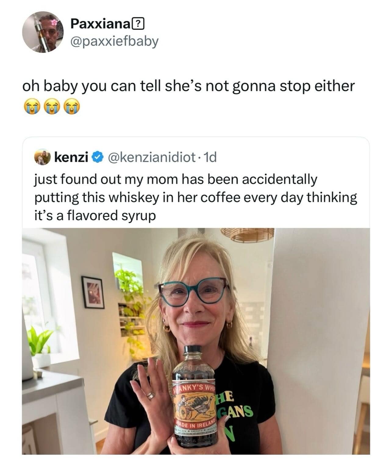A funny tweet about a mom who accidentally put whiskey in her coffee daily, thinking it was syrup.