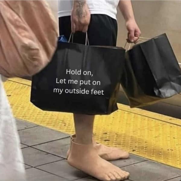 A funny meme and cursed image of a person wearing "outside feet" prosthetics over their shoes.