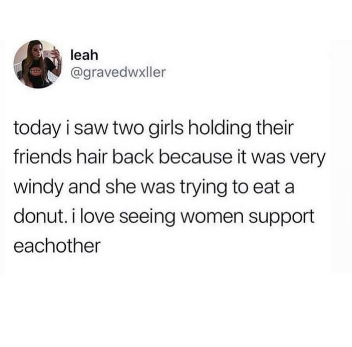 A funny meme about true friendship, showing a tweet about girls holding back hair from the wind for a friend.