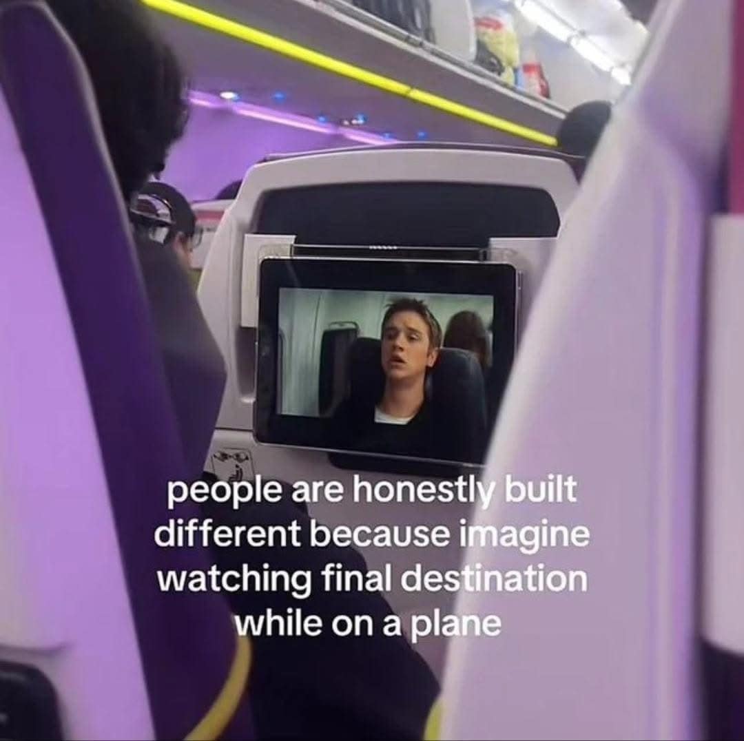 Passenger watching Final Destination on a plane seat screen