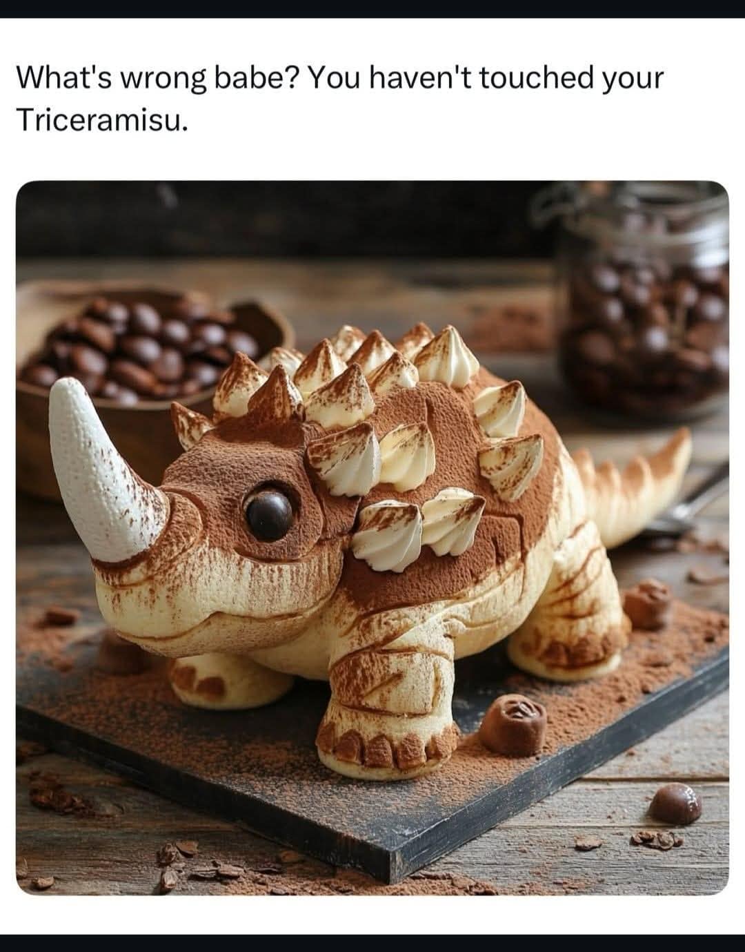 Triceratops-shaped tiramisu dessert on a wooden board