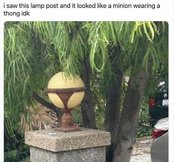 A funny pic of a round, yellow lamp post that looks exactly like a Minion wearing a thong.