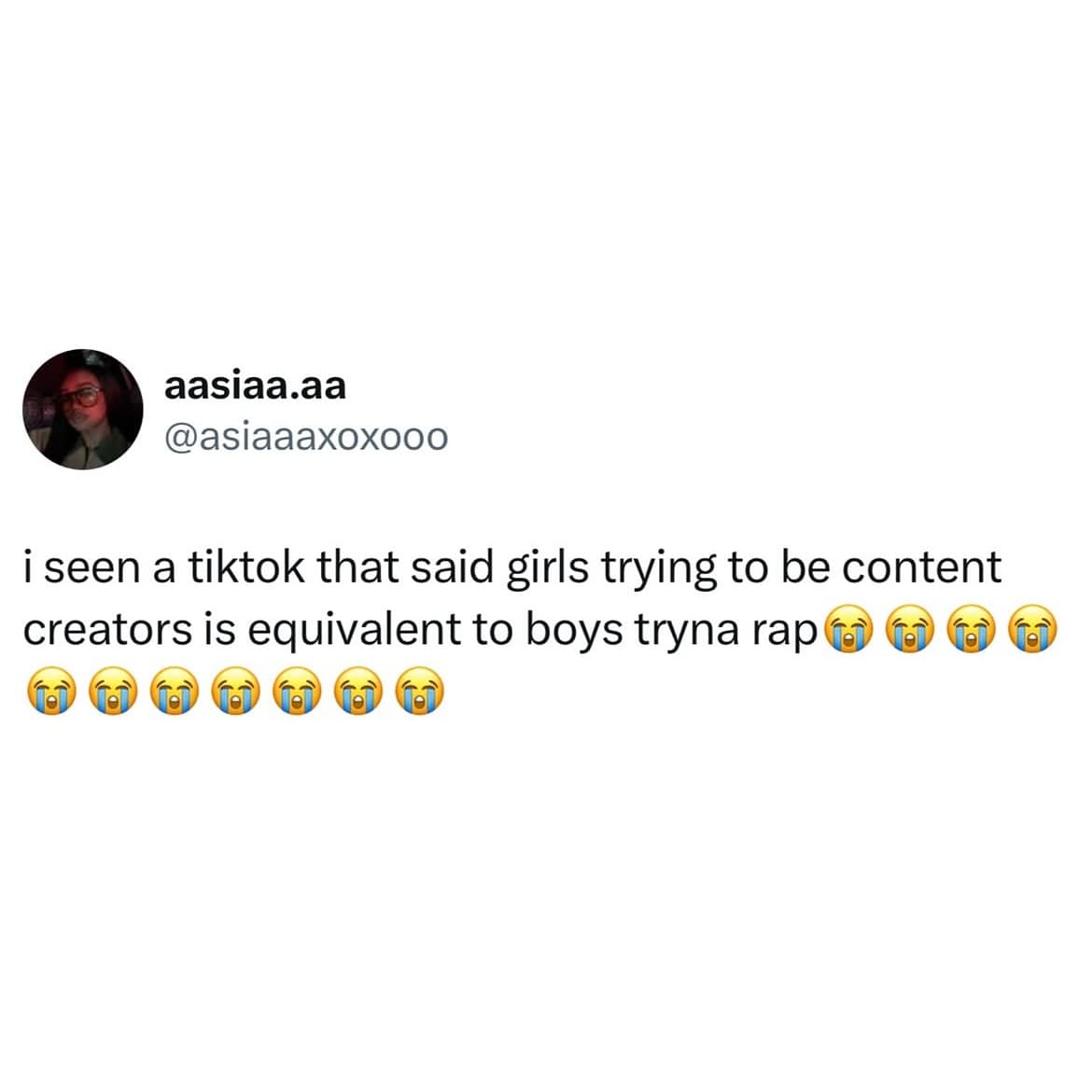 A tweet comparing aspiring female content creators to aspiring male rappers, followed by laughing emojis.