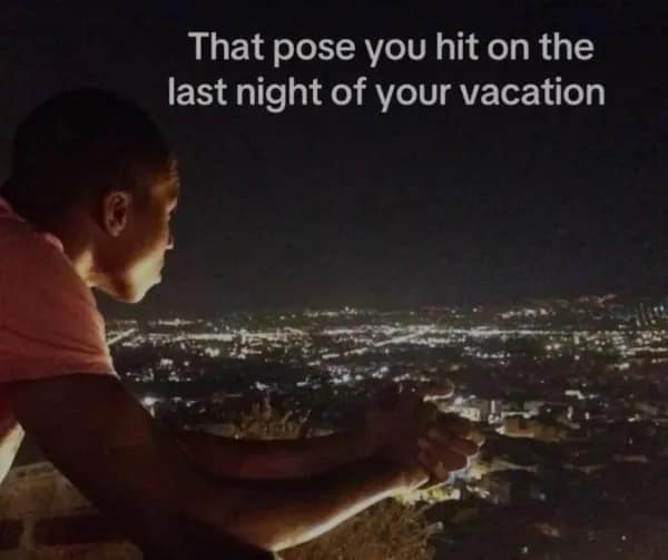 A meme of a man staring thoughtfully over a city, a classic vacation funny picture.