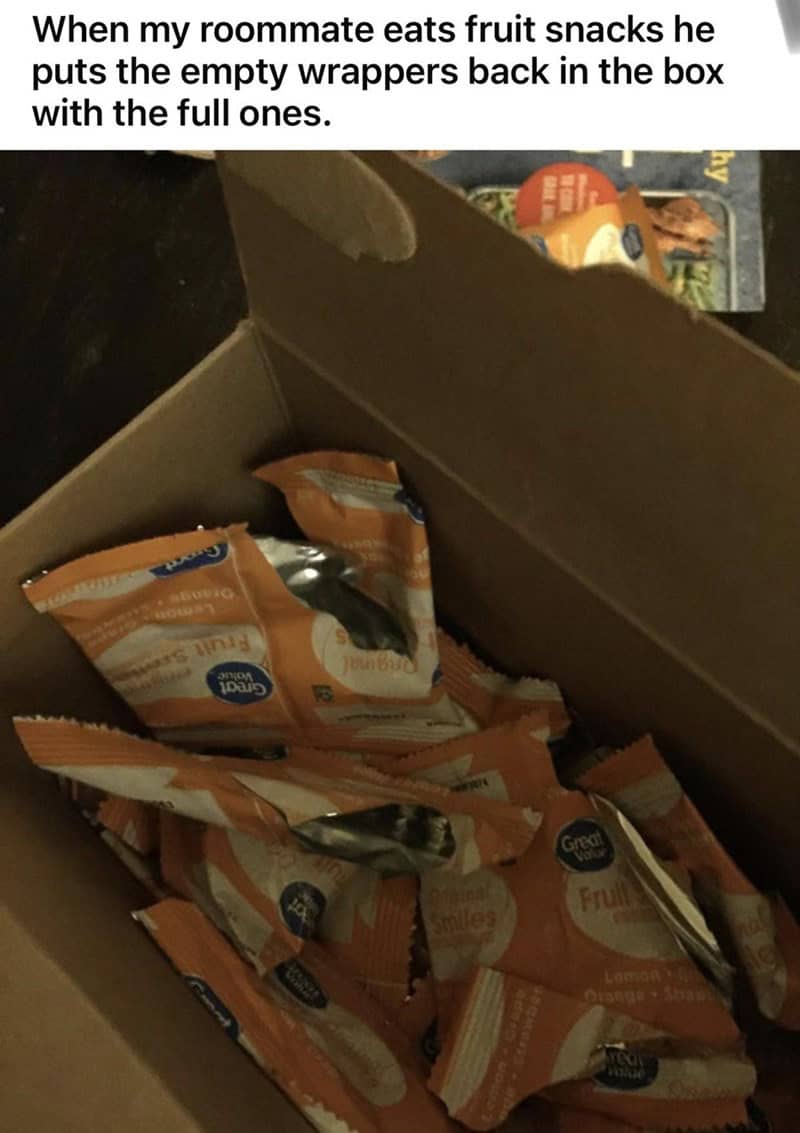 A box of fruit snacks where empty, used wrappers are put back inside with new ones.