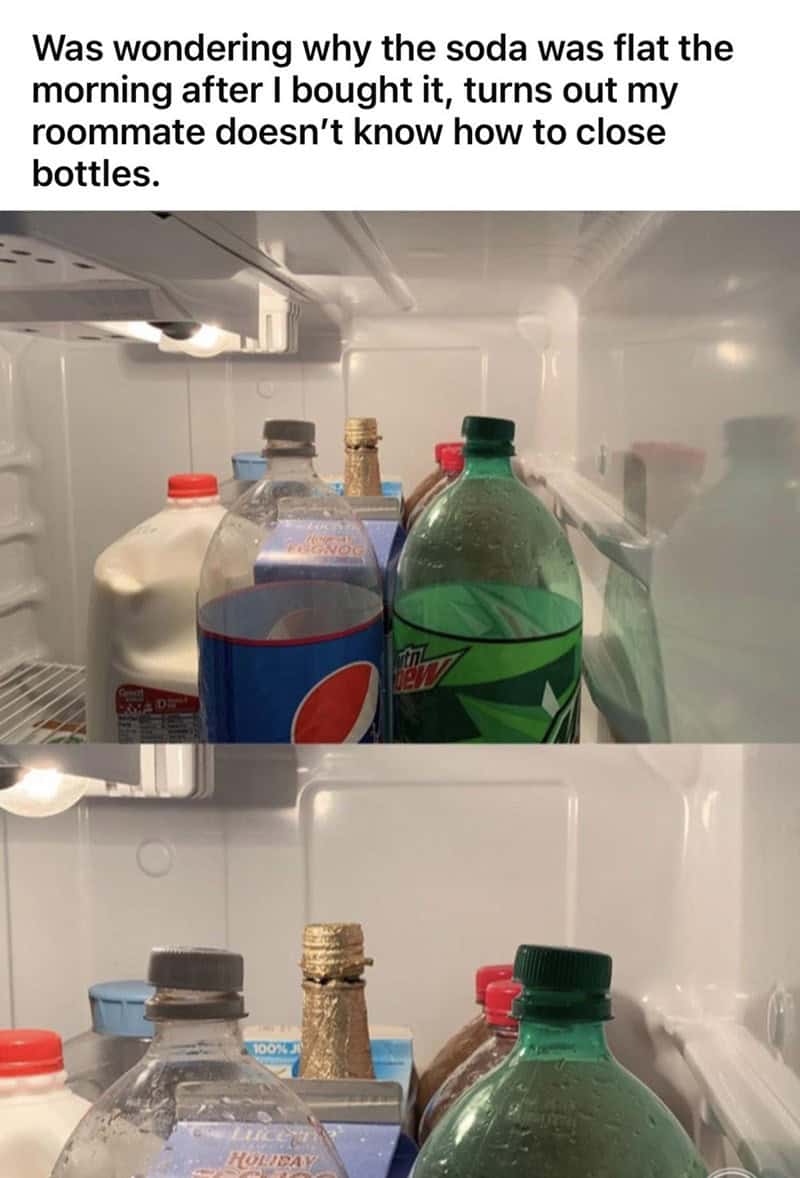 Several large soda bottles in a refrigerator with their caps resting loosely on top, unsealed.