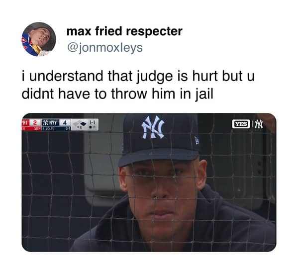 Judge in Yankees dugout with caption about being thrown in jail