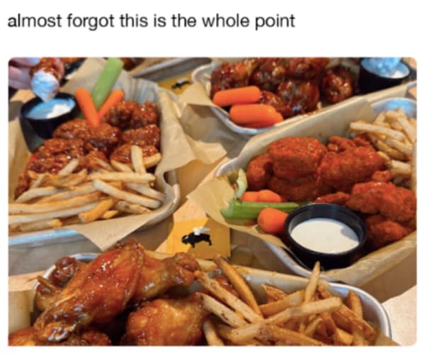 Plate of chicken wings, fries, and vegetables at Buffalo Wild Wings