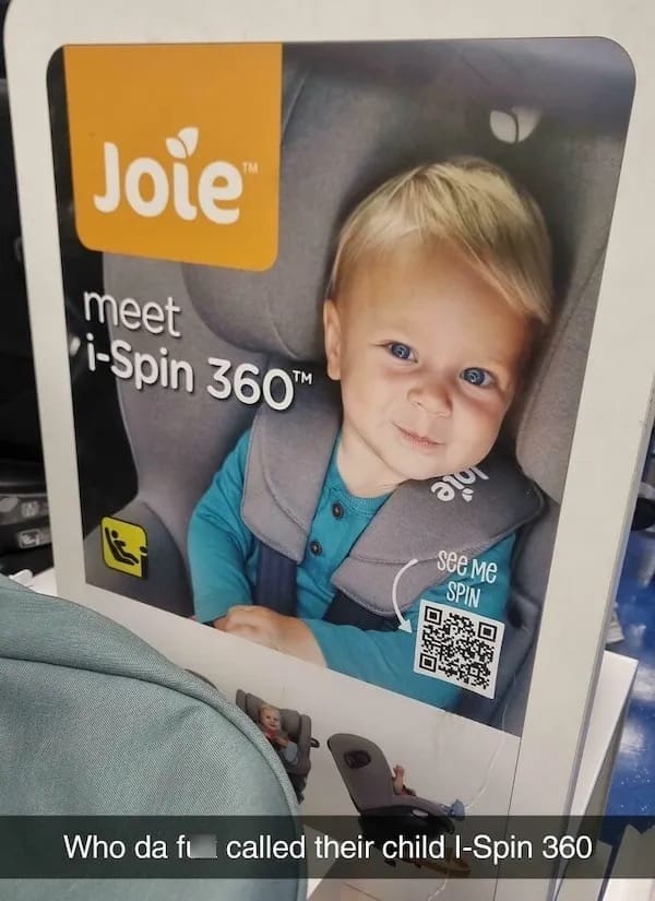 Store display for Joie i-Spin 360 car seat says “meet i-Spin 360” beside a baby, implying it’s the child’s name.