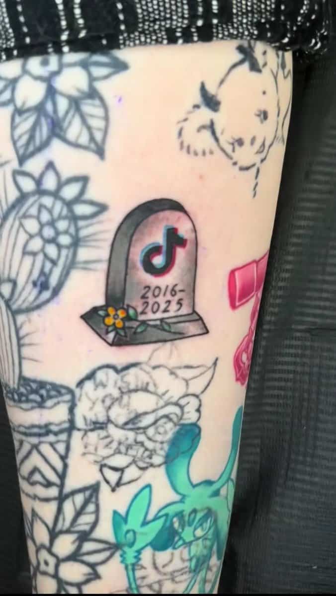 A tattoo of a gravestone for the TikTok app with the dates "2016-2025."