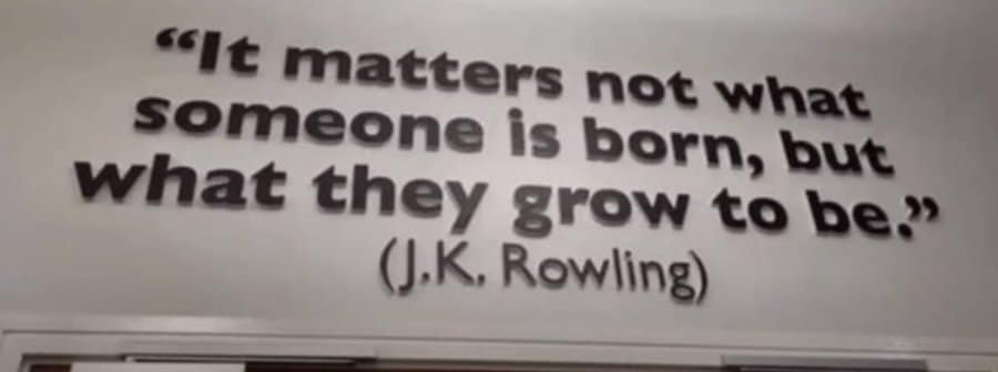 A wall decal of a J.K. Rowling quote: "It matters not what someone is born, but what they grow to be."