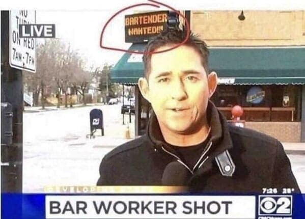 A red circle highlights a "Bartender Wanted" sign above a news reporter.