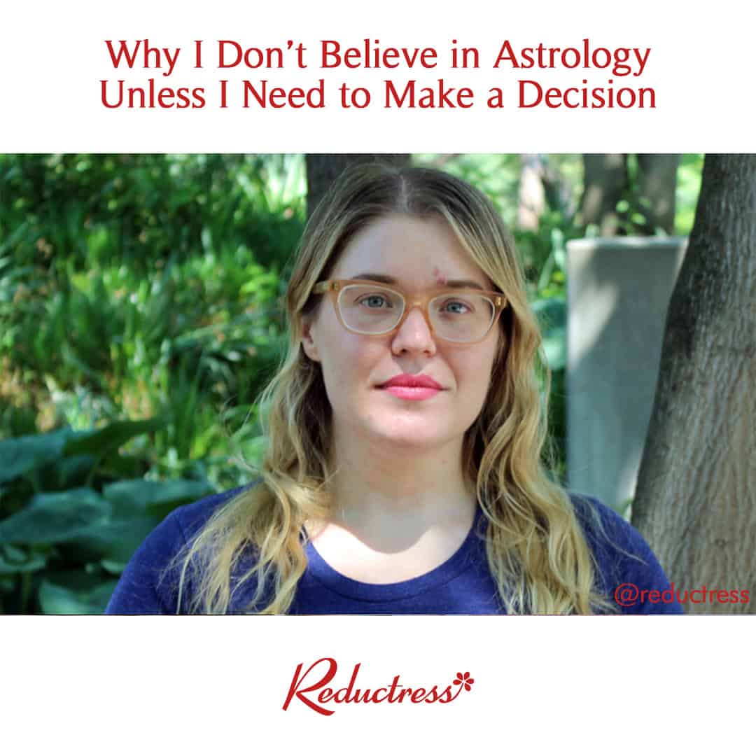 Woman with glasses staring into the camera in a wooded park; headline reads, "Why I Don’t Believe in Astrology Unless I Need to Make a Decision."