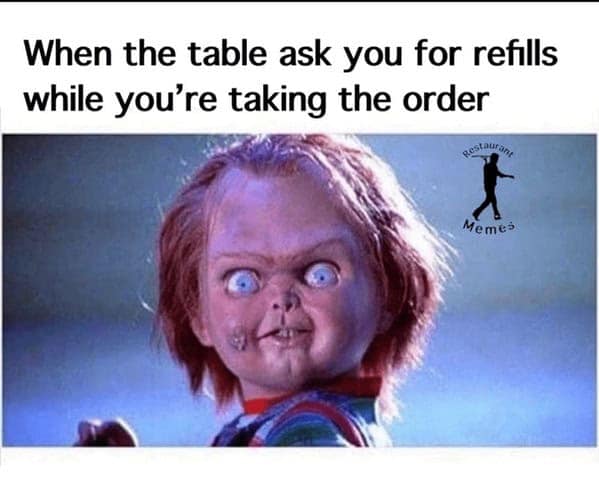 A funny restaurant meme using Chucky to show a server's frustration with interruptions.