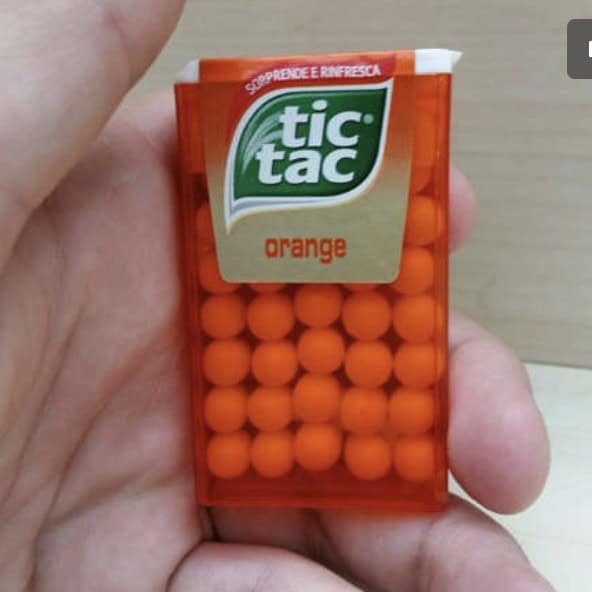 Tic Tac box packed into a flawless grid of round candies