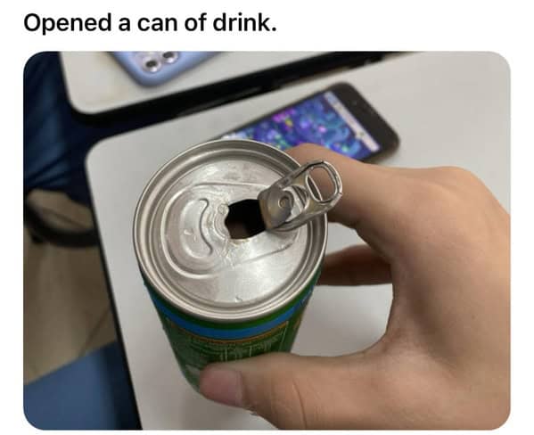 Soda can opened with pull tab but hole missed entirely