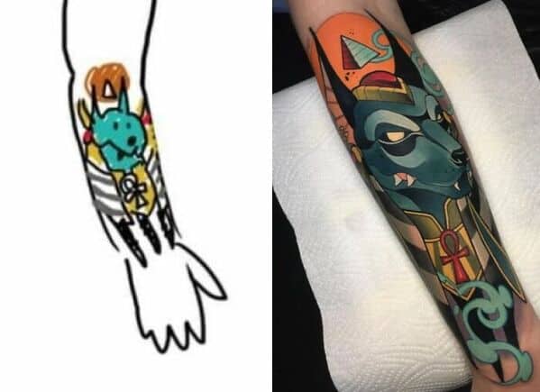Forearm tattoo of Egyptian Anubis inspired by cartoon-style drawing