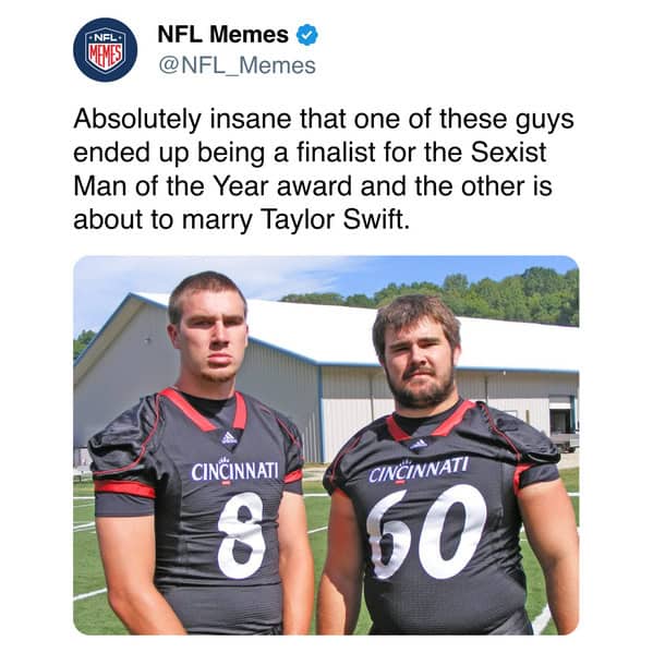 Two college football players in black jerseys pose outdoors.
