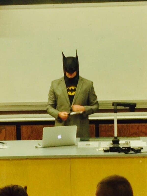 A funny teacher prank where the professor is dressed up as Batman while giving a lecture.