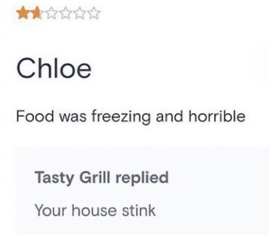 One-star review claiming food was cold, with a savage reply from the restaurant.