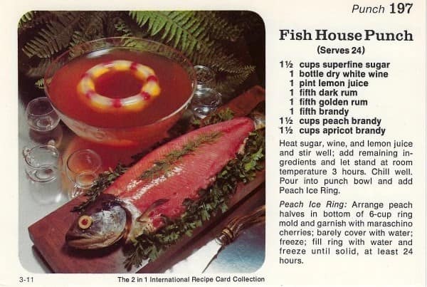 A bizarre vintage recipe for "Fish House Punch" featuring a whole raw fish garnish.