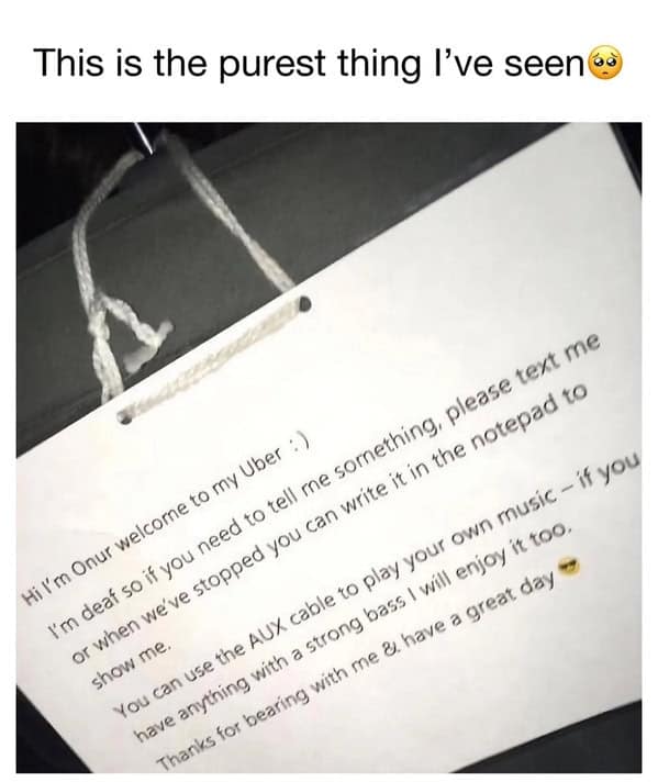 Sign from a deaf rideshare driver inviting riders to text, write notes, and use the AUX cable