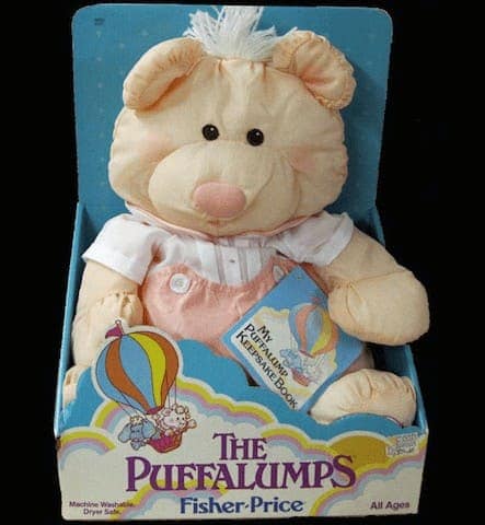 A Fisher-Price Puffalumps plush bear in its original 80s toy packaging.