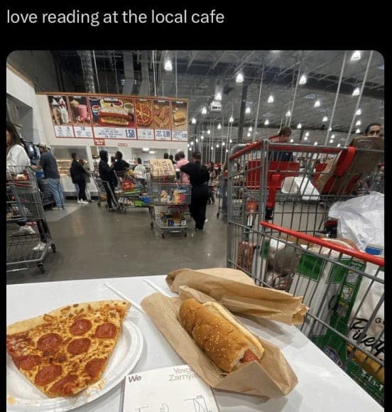 A person eating pizza and a hot dog in a Costco food court, with the ironic caption "love reading at the local cafe."