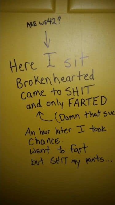 A photo of a classic "Here I sit, brokenhearted" bathroom stall poem that has been added to and modified by several different people over time.
