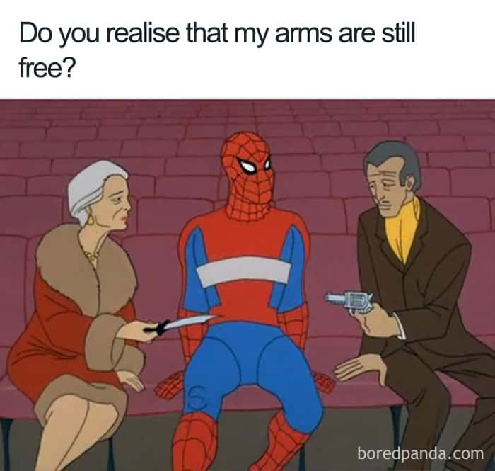 Spider-Man being held hostage by two elderly people despite having his arms free