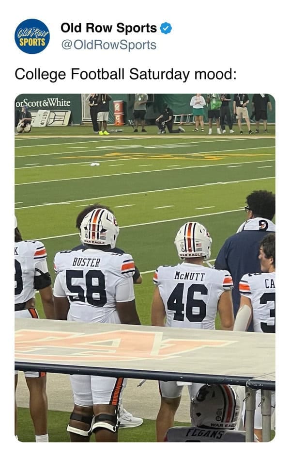 A funny sideline photo of two Auburn football players with the last names "Buster" and "McNutt" standing next to each other.